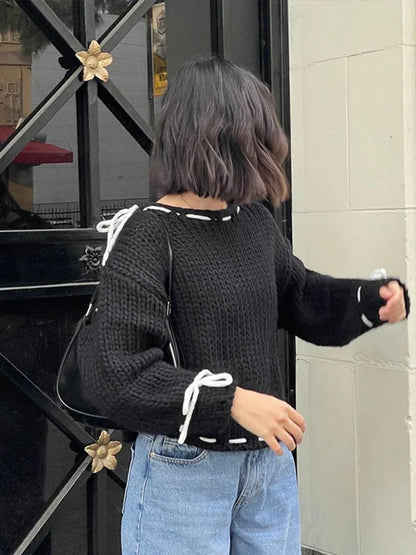 Suéter de lana mujer con lazos, elegante y juguetón